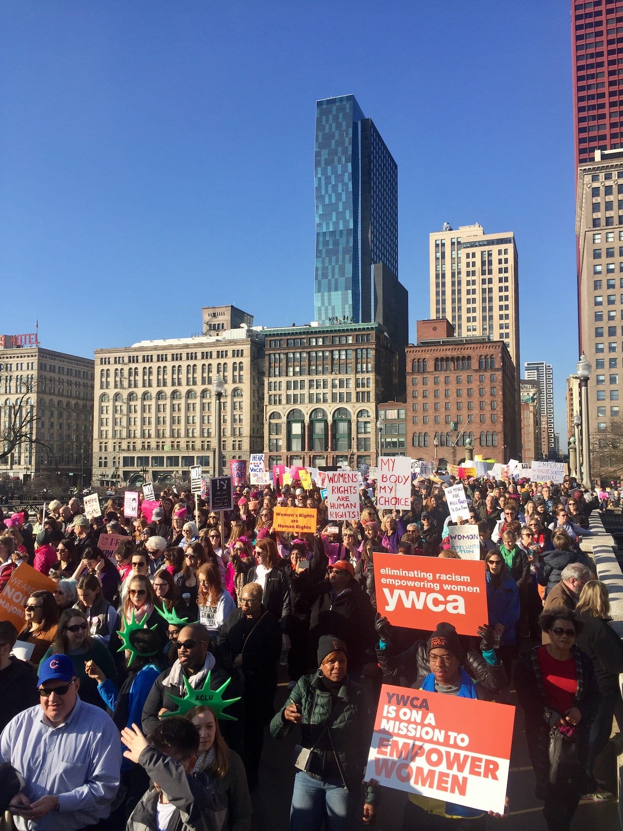 YWCA protesters march outside for a rally to eliminate racism and empower women.