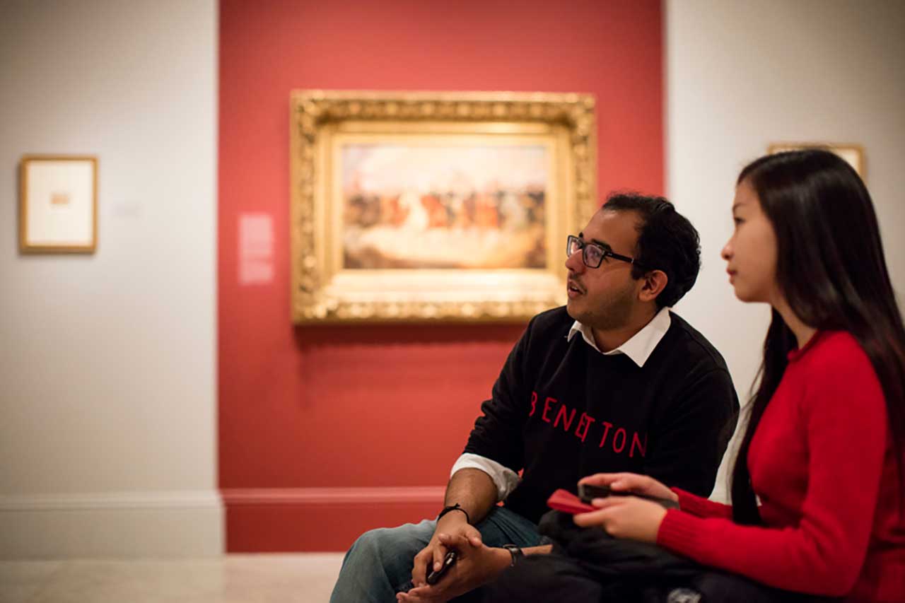 [Students view art at the Smithsonian National Portrait Gallery.]