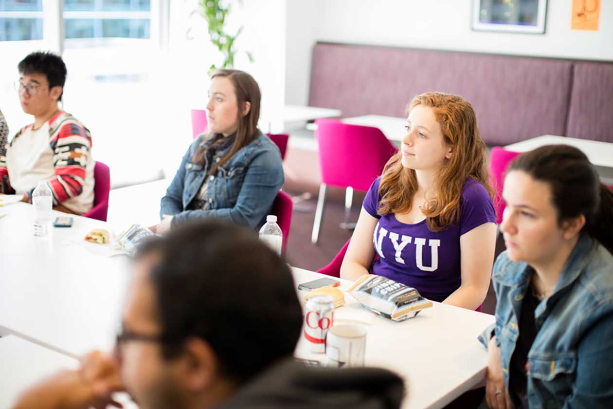 Students attend a networking event at NYU Washington, DC.
