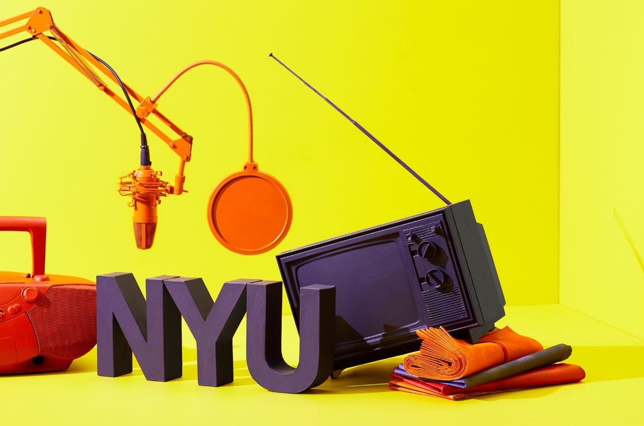 “NYU” block letters beside a microphone, radio, newspapers, and television.