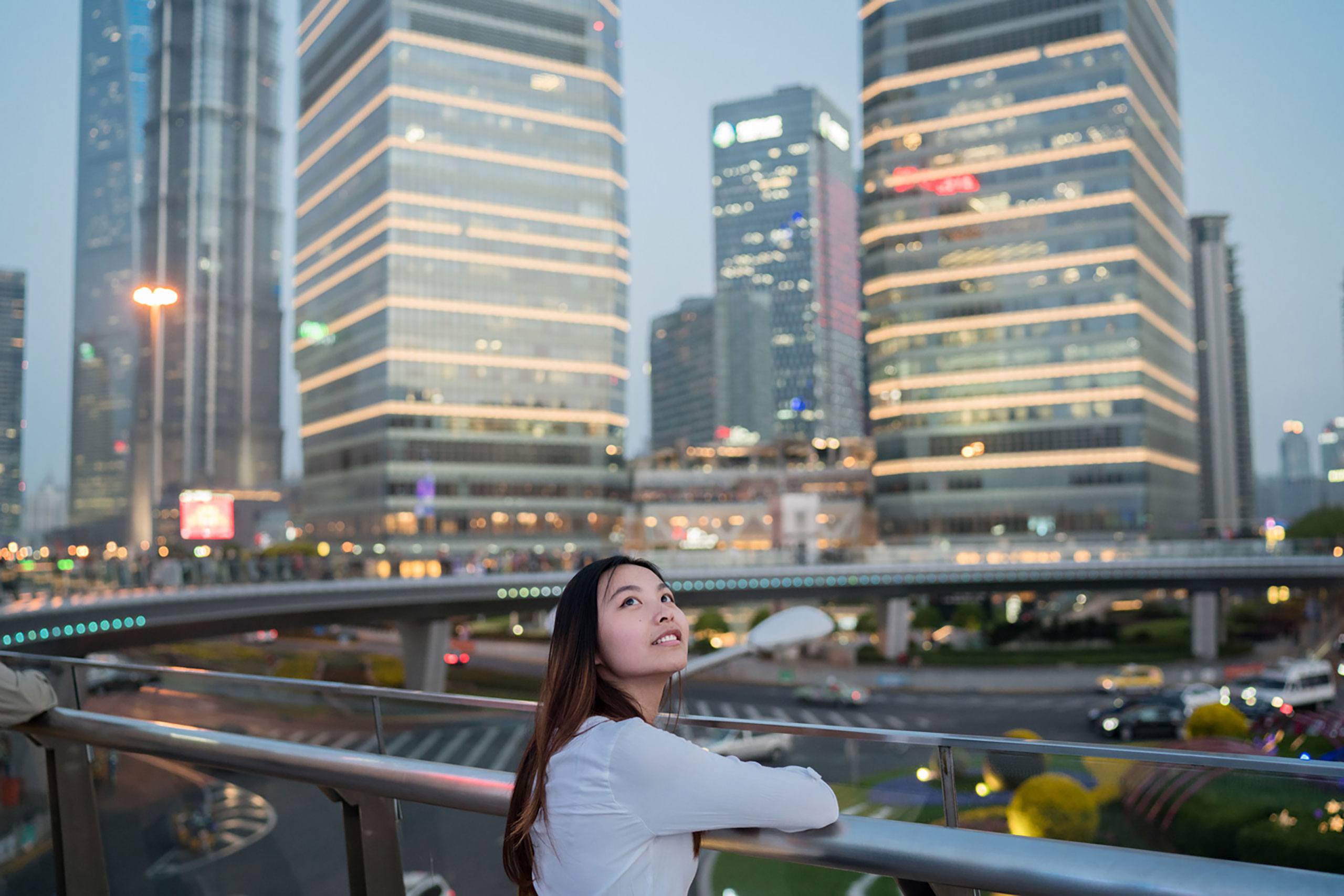 Student with the financial district in the background