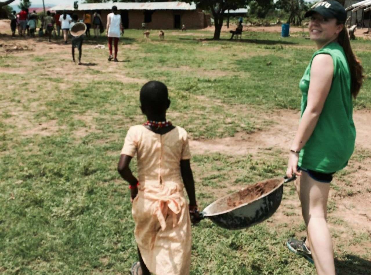 Krista carrying supplies in Accra