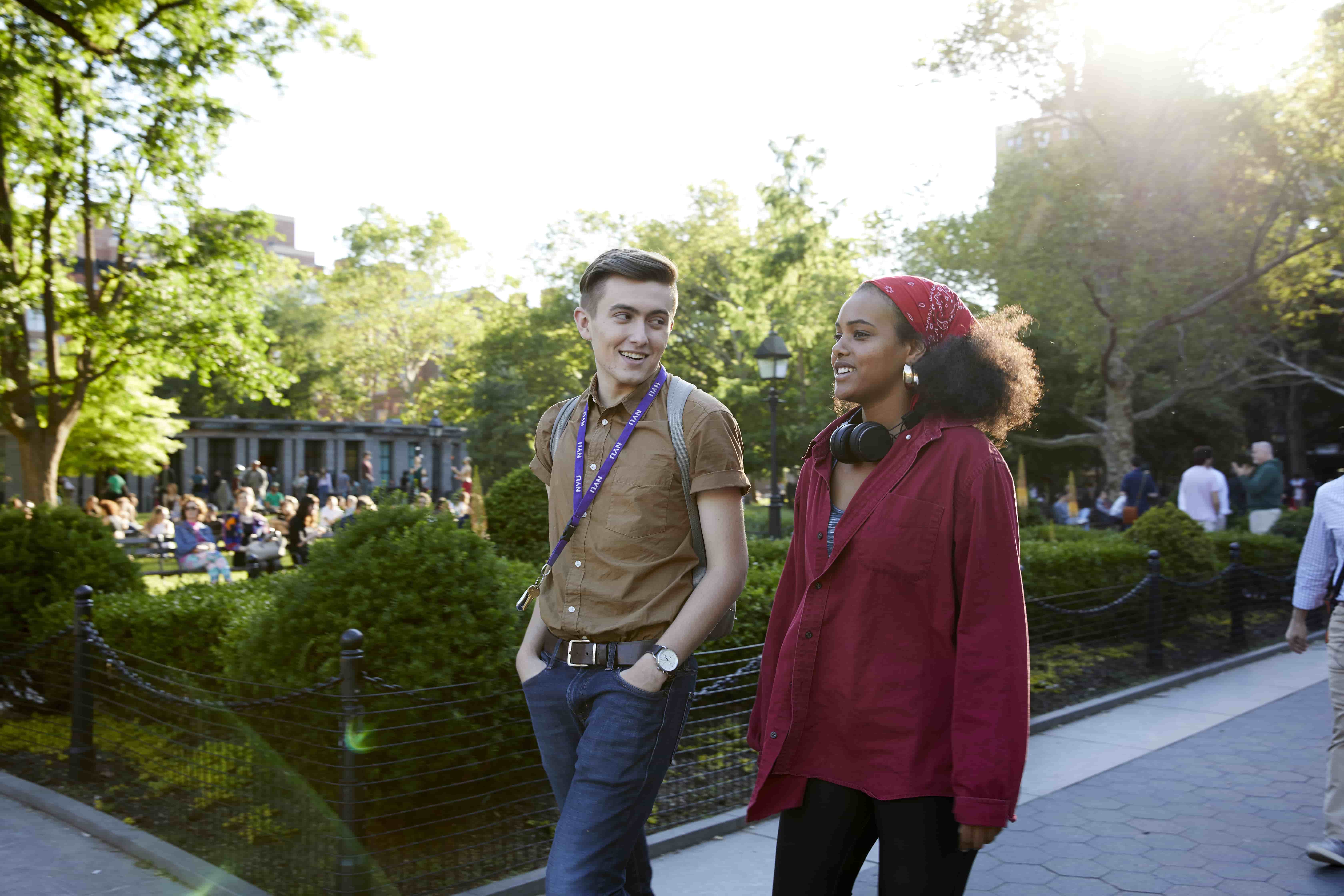 NYU students walking through Washington Square Park.