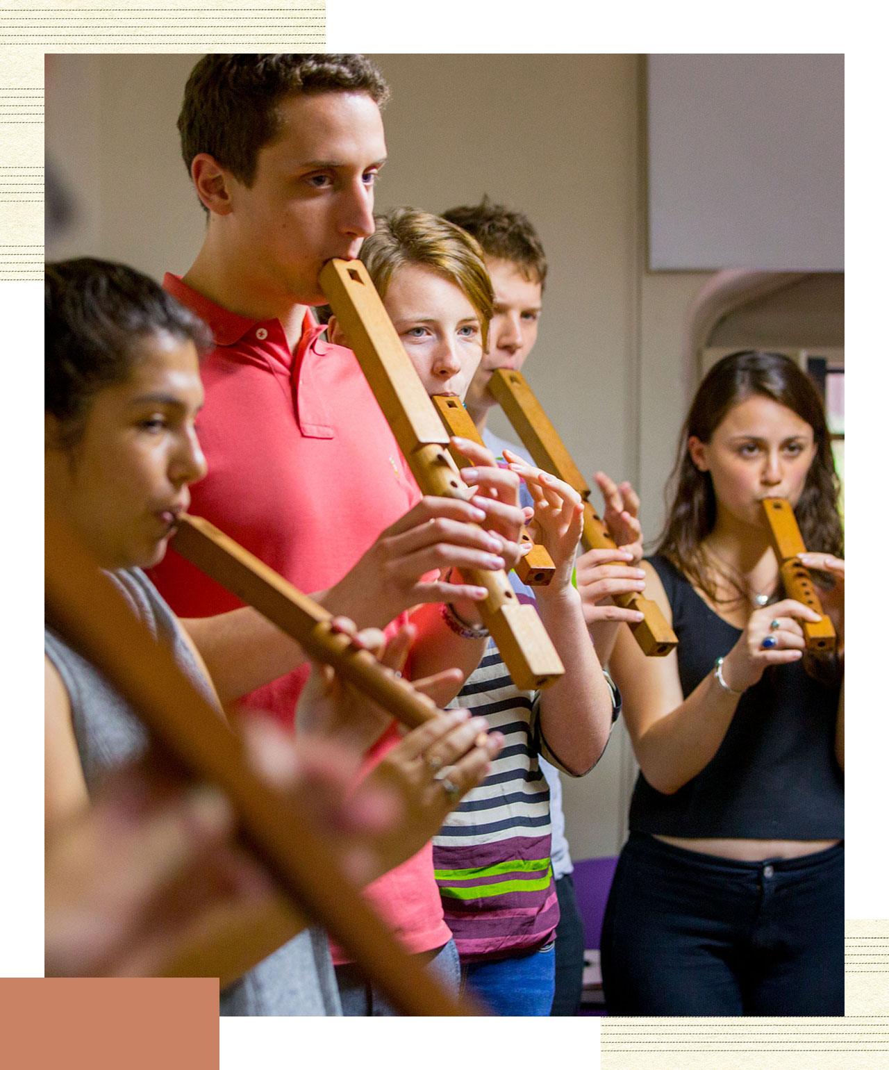 A group of students playing wind instruments.