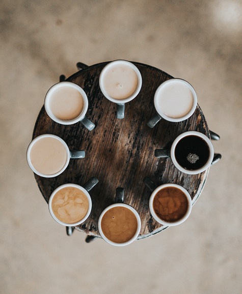 Aerial shot of multiple cups of coffee.