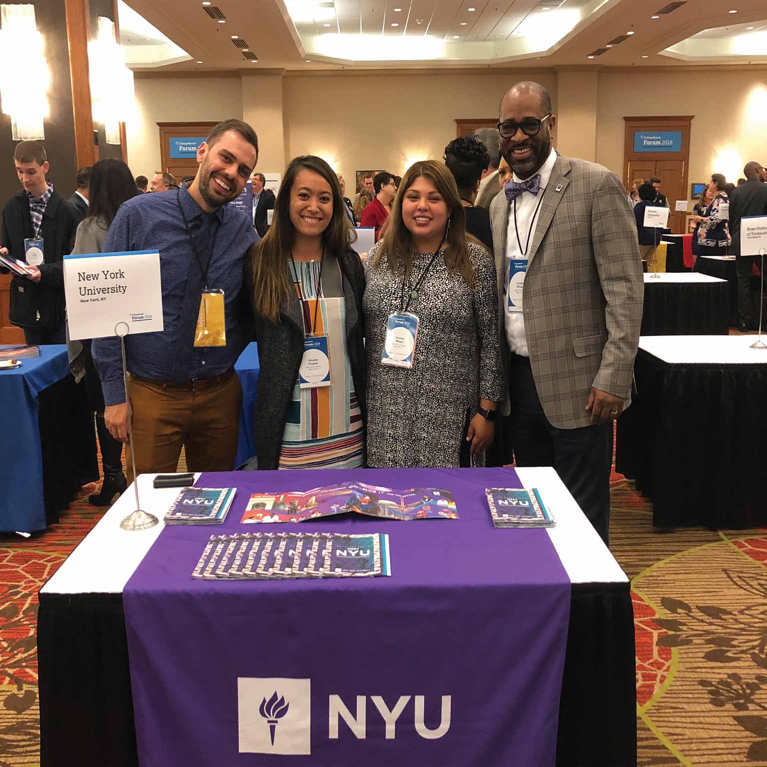 NYU admissions staff at a college fair.