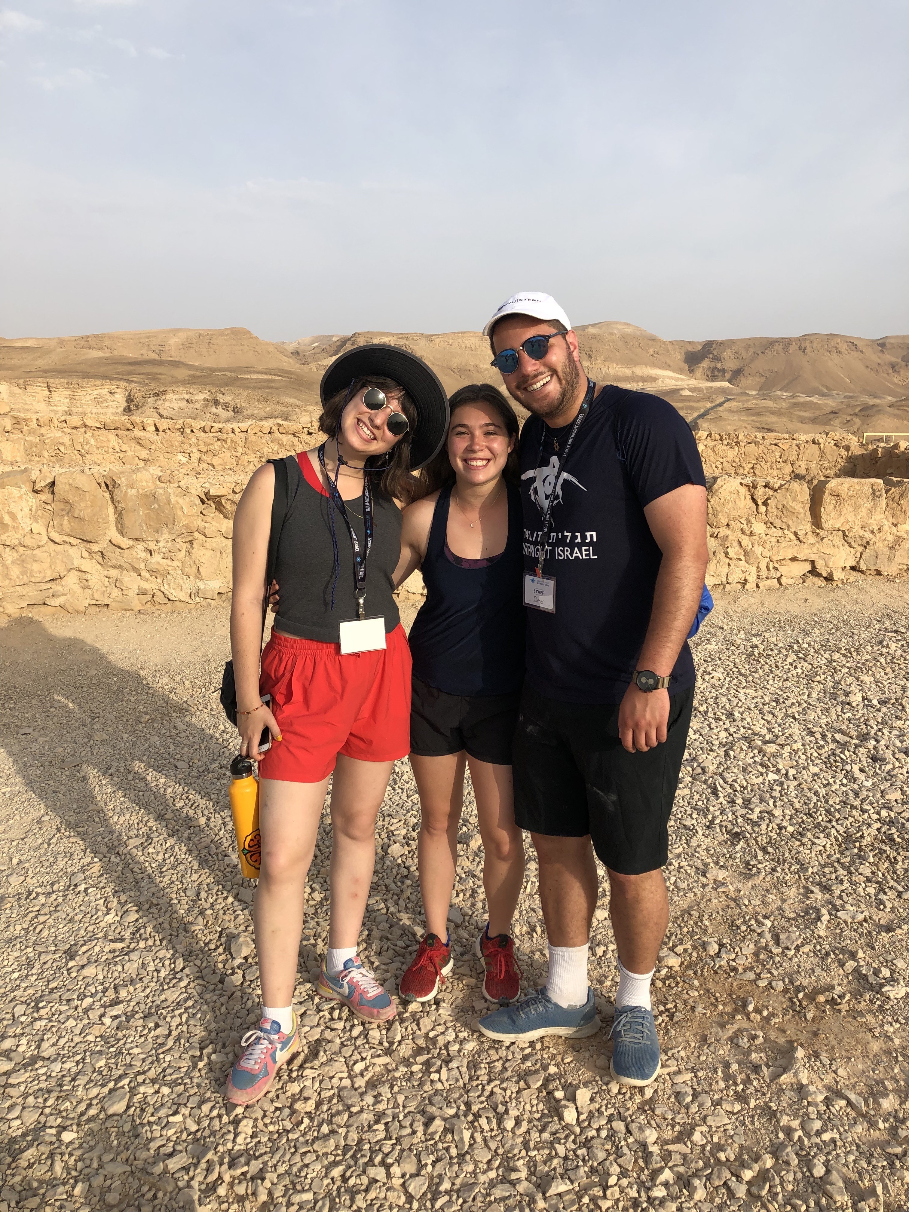 Three people in the desert