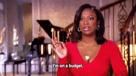GIF of a woman saying, “I’m on a budget.”