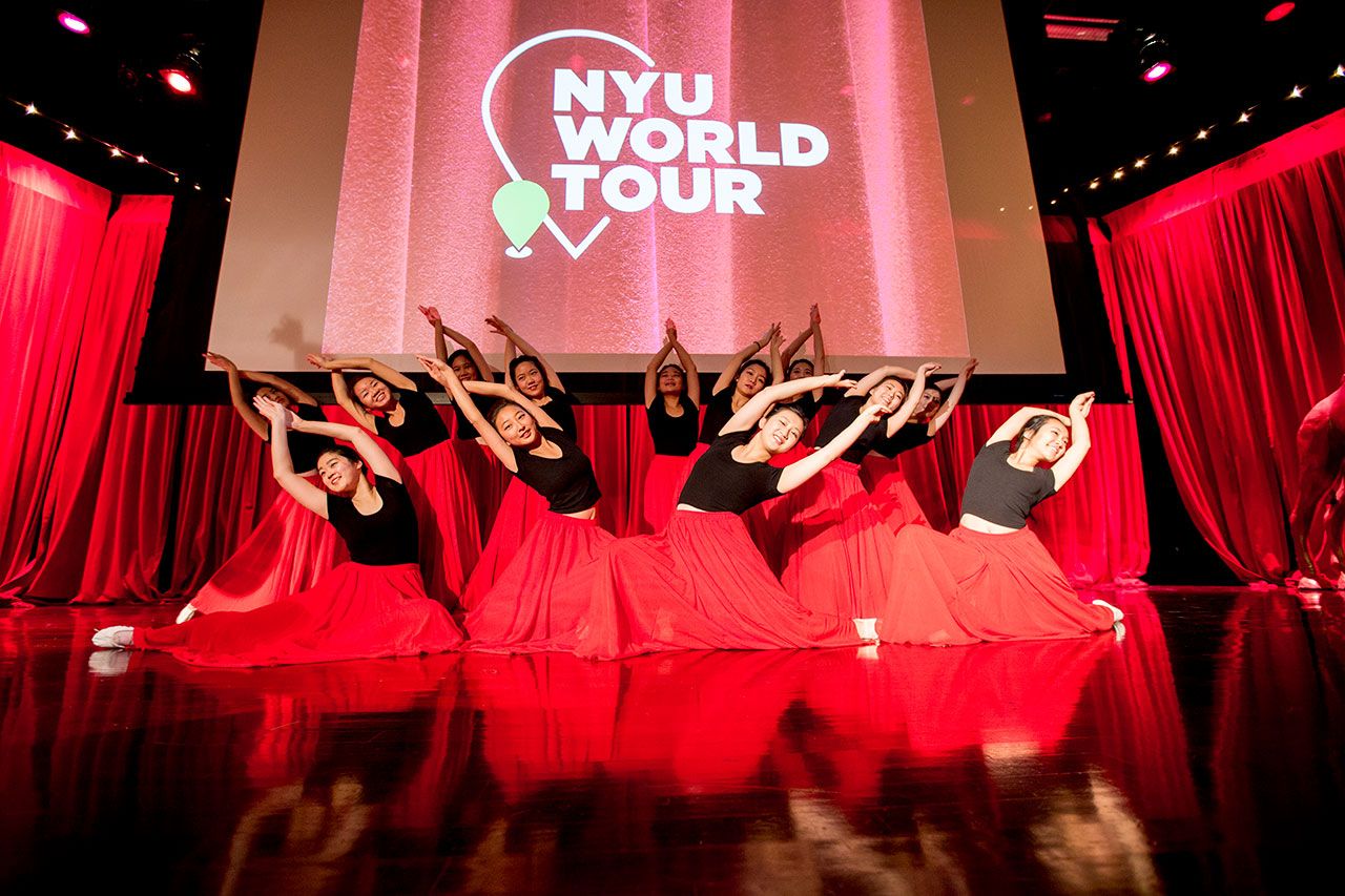Dancers performing at the NYU World Tour event.