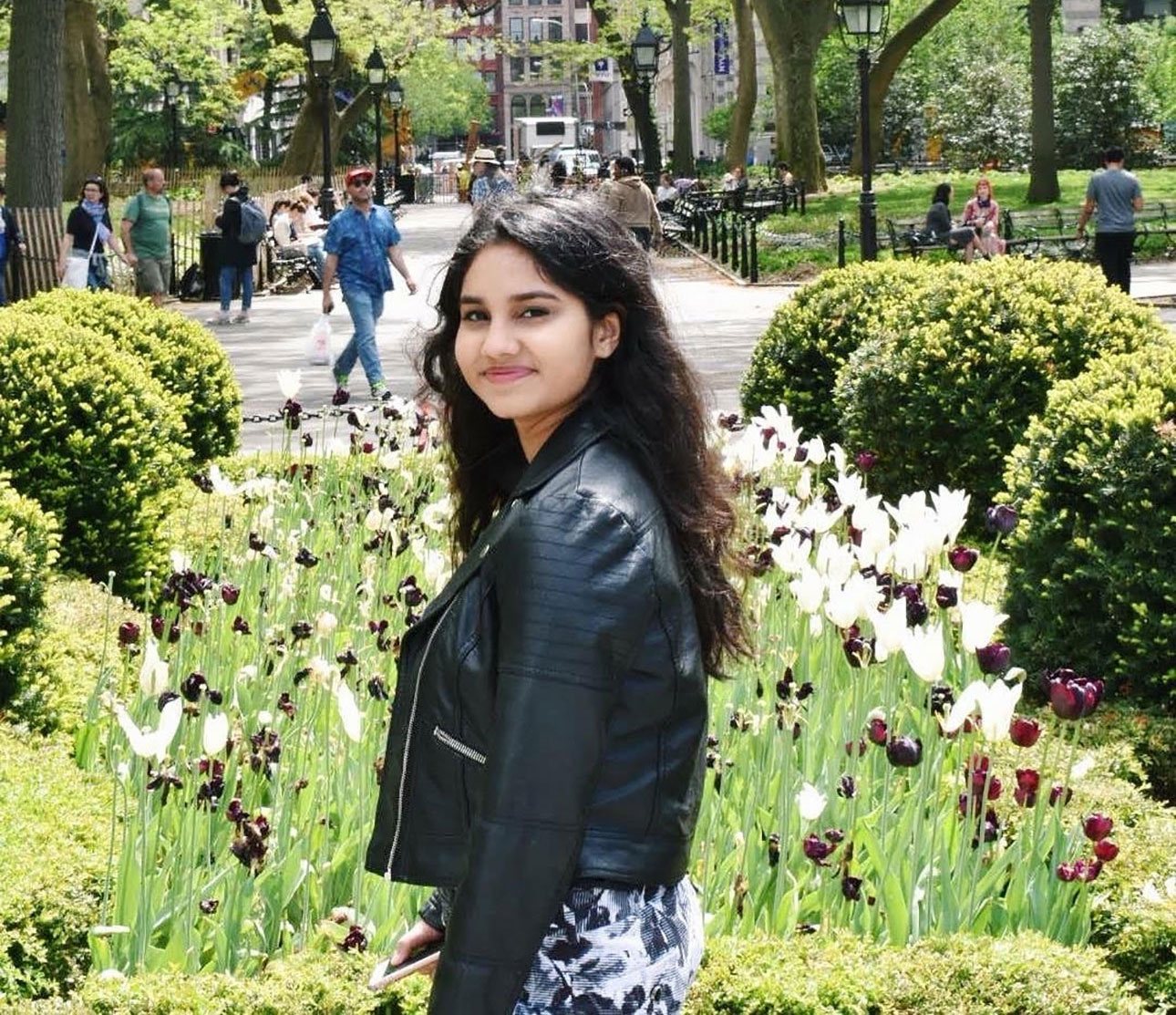 NYU Stern student Avni Bodwadkar posing in Washington Square Park, New York City.