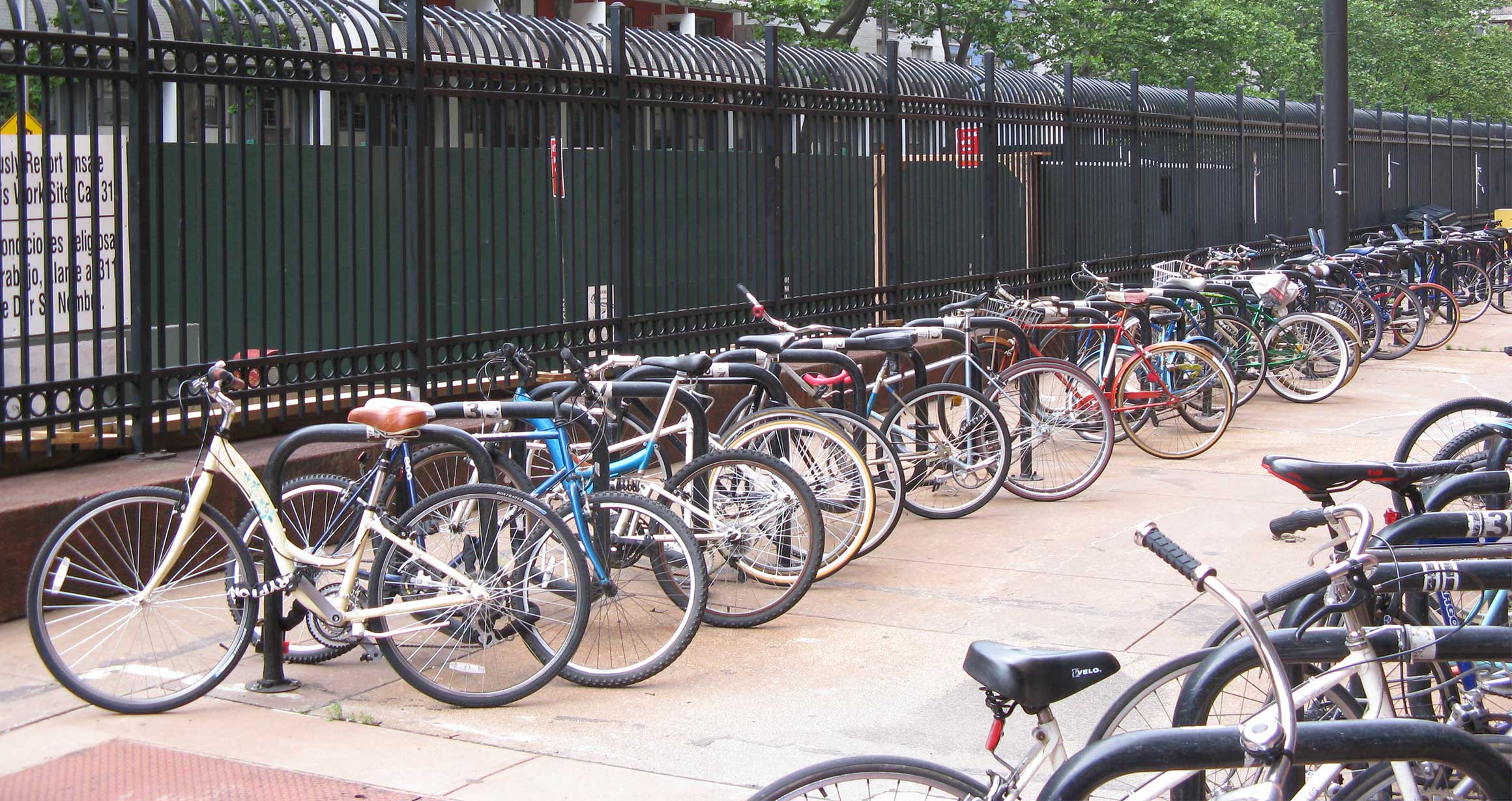 A row a bicycles behind Tisch Hall