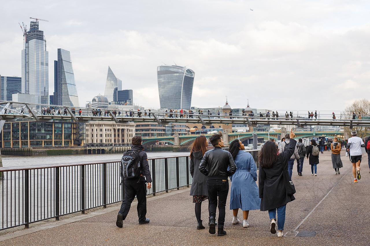 NYU students strolling along the Thames Path in London.