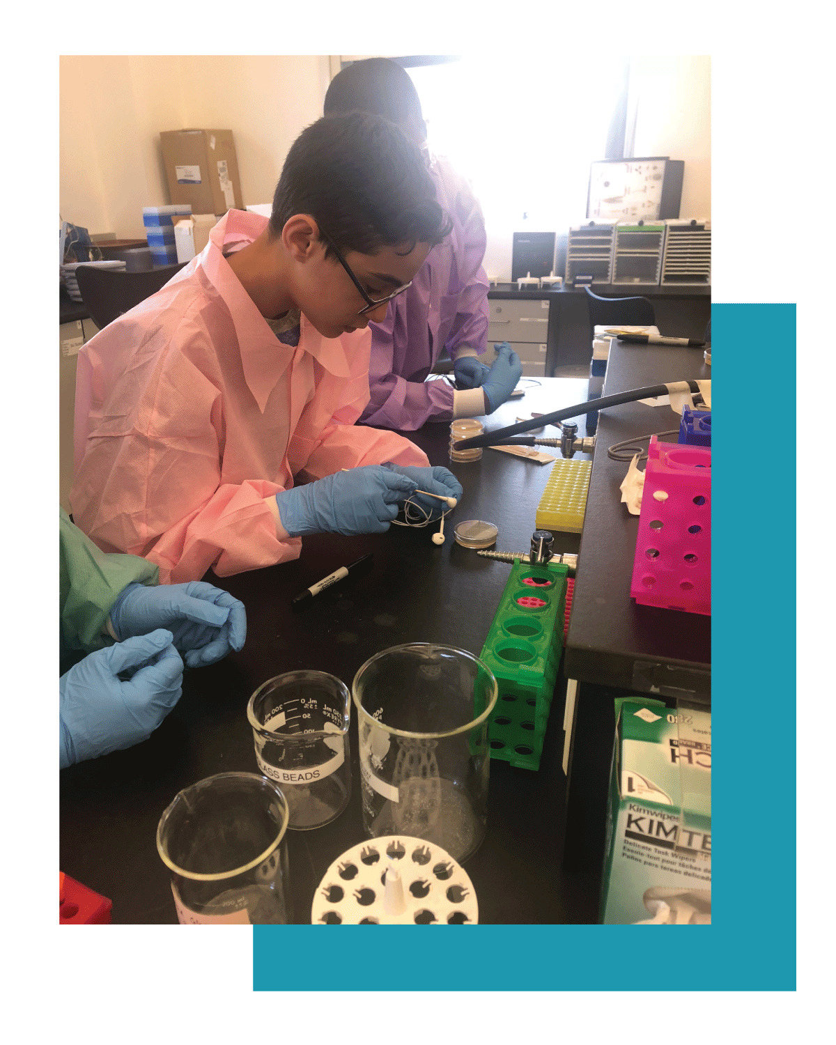 STEP student Omer Mosker working in a science lab.