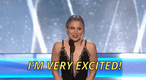 gif- Kristen Bell on stage at an awards show