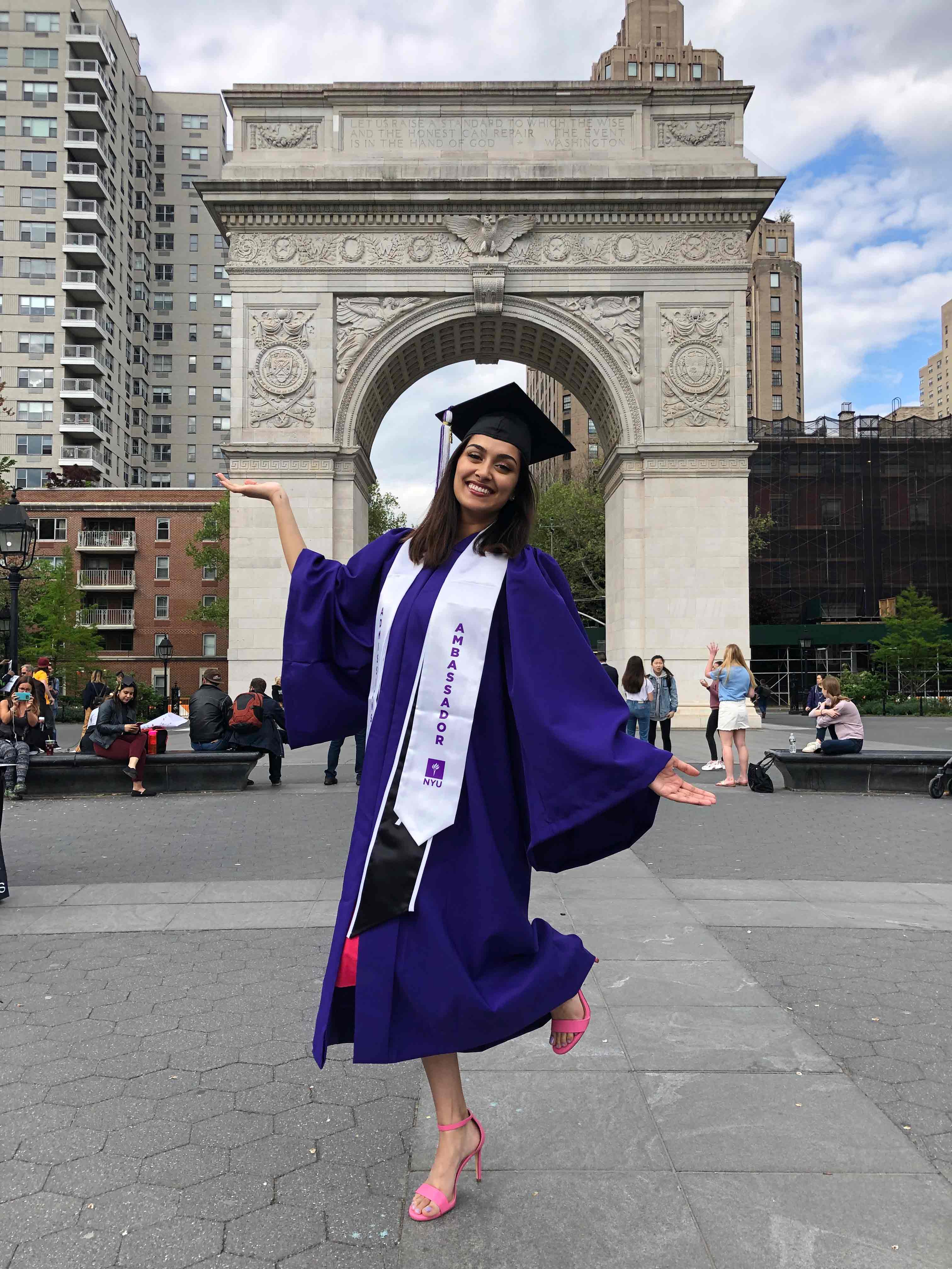 student graduating in Washington Square Park