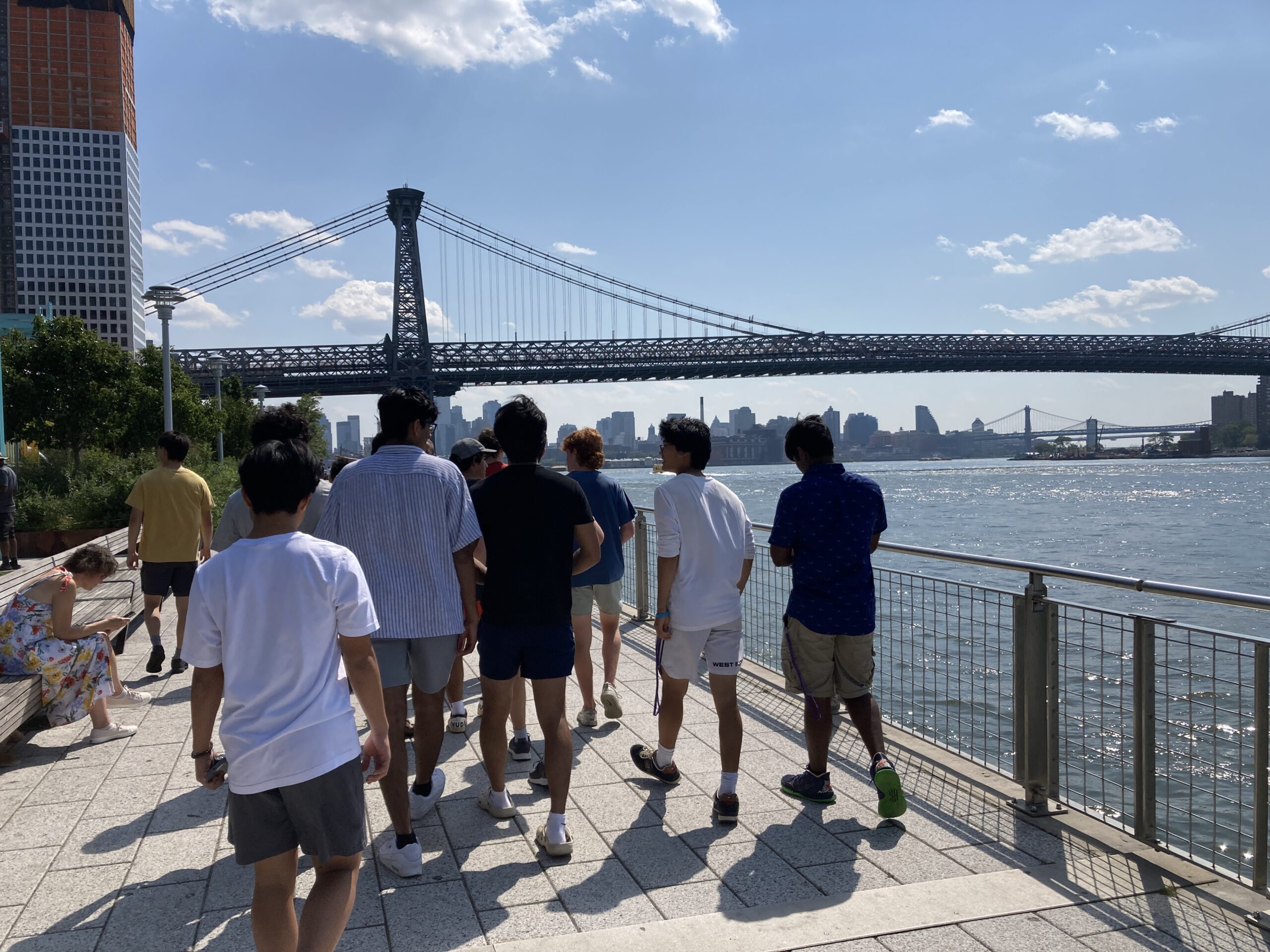 Students walking along the Hudson River