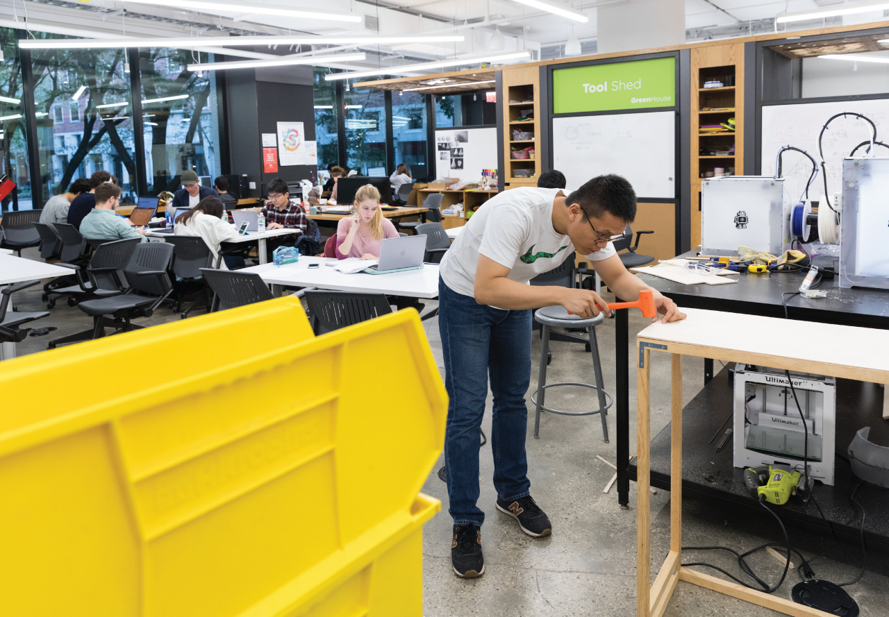 Students conducting engineering research in NYU Tandon’s MakerSpace.