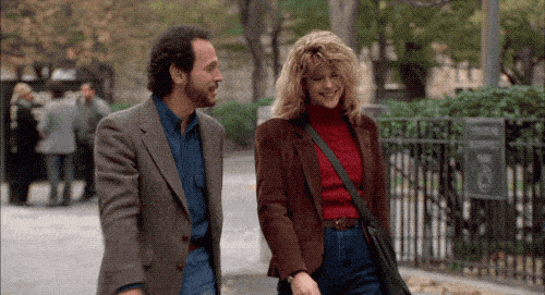 Harry and Sally of “When Harry Met Sally” walking in New York City park.