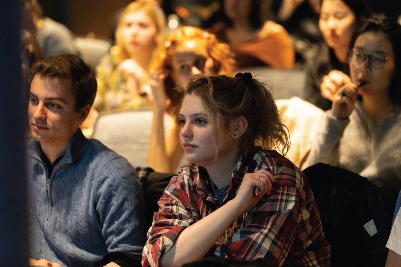 A student listening in a seminar