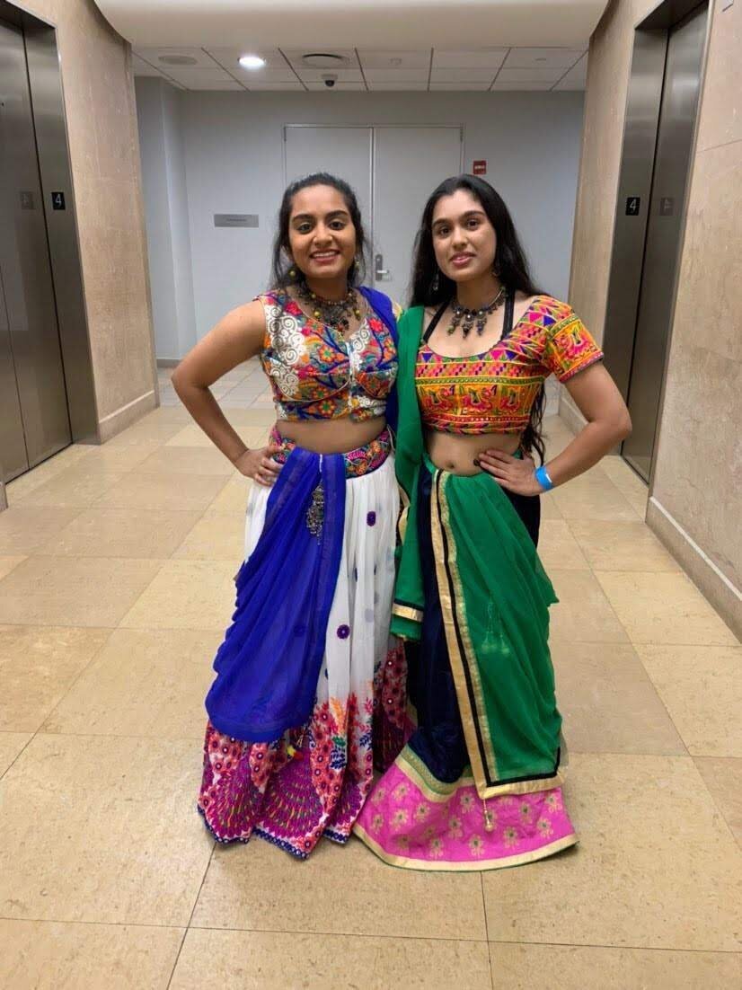 Two girls in ethnic Indian wear.