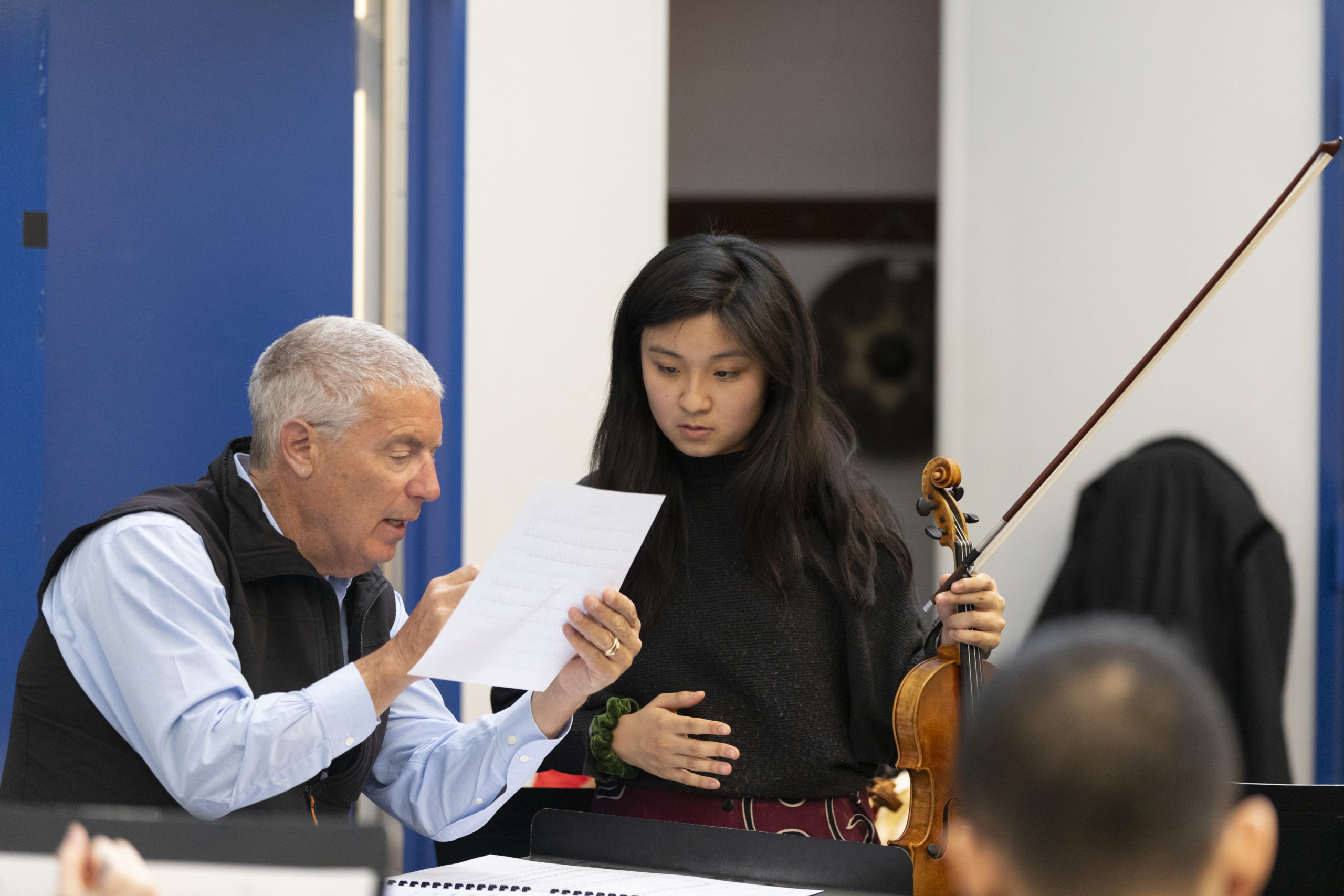 A music student speaking with a professor.