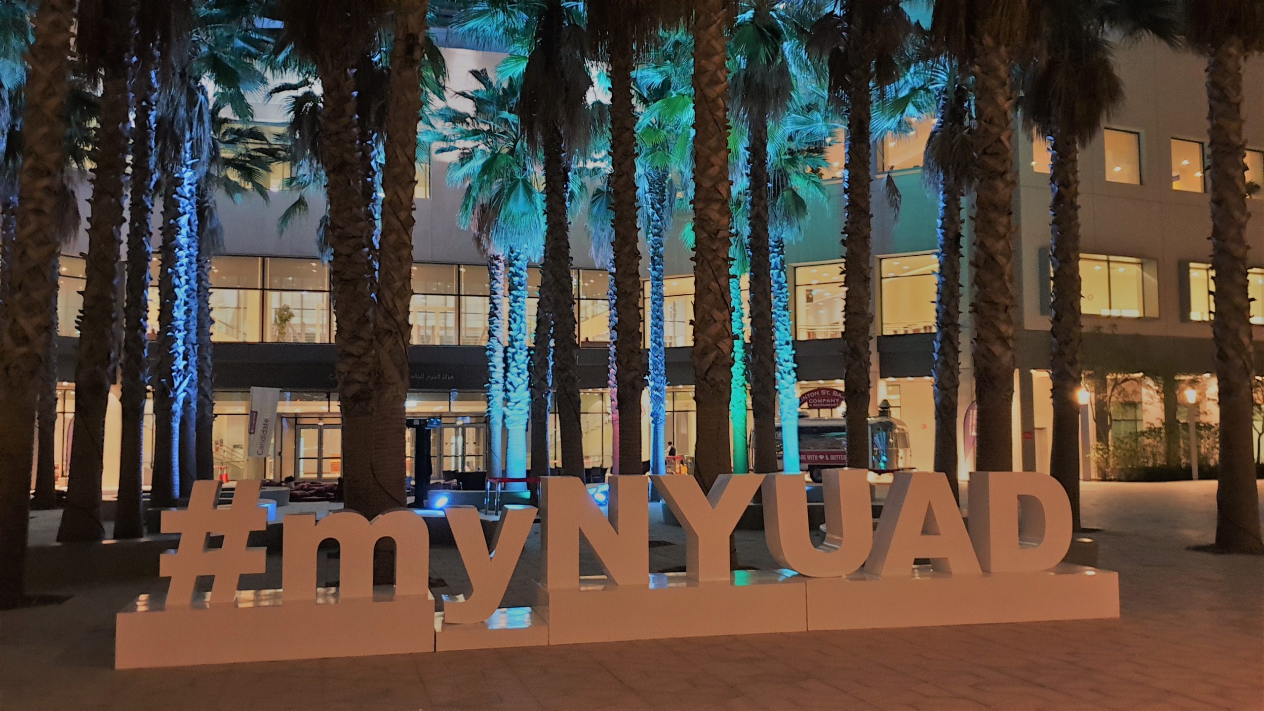 The “#myNYUAD” sign in front of campus.