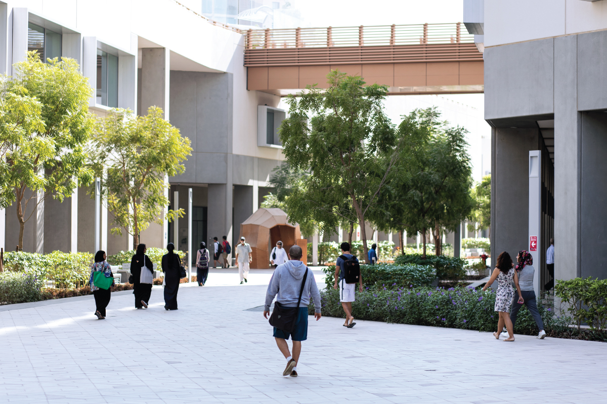 Students walking on the NYU Abu Dhabi campus.