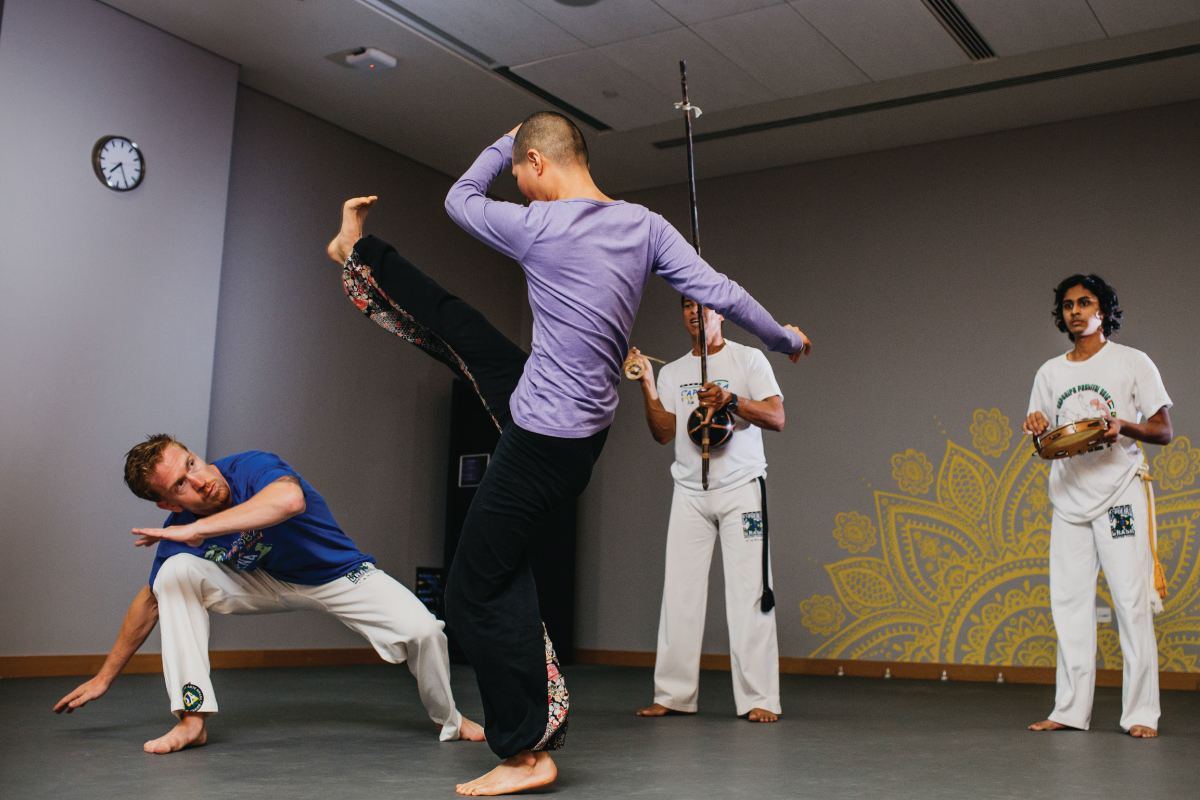 A group of students practicing martial arts.