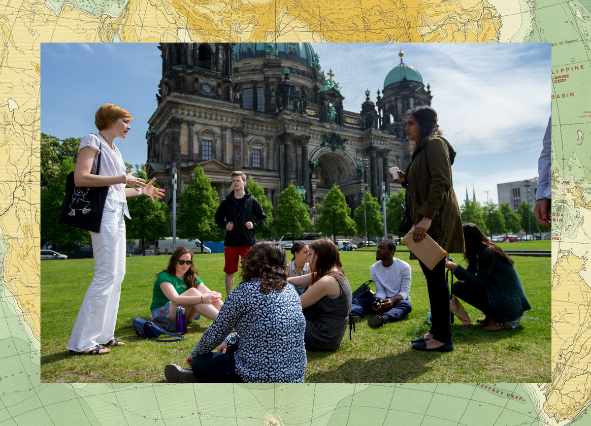 A group of study away students sitting in front of the Berliner Dom in Berlin.