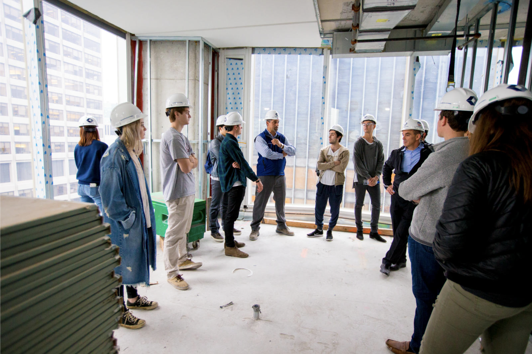Students on a tour of a construction site.