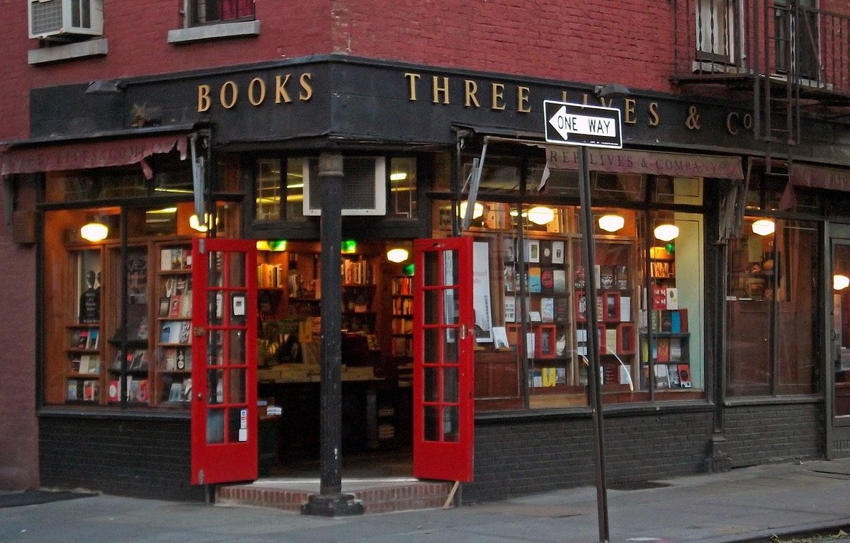 A view of the corner storefront of Three Lives and Company bookstore.
