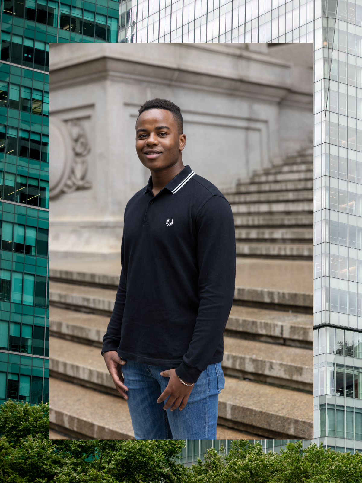 David Obwaya, a senior student of color studying economics at the College of Arts and Science, stands on NYU steps.
