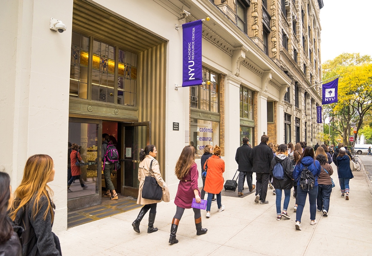 Students outside an NYU academic building.