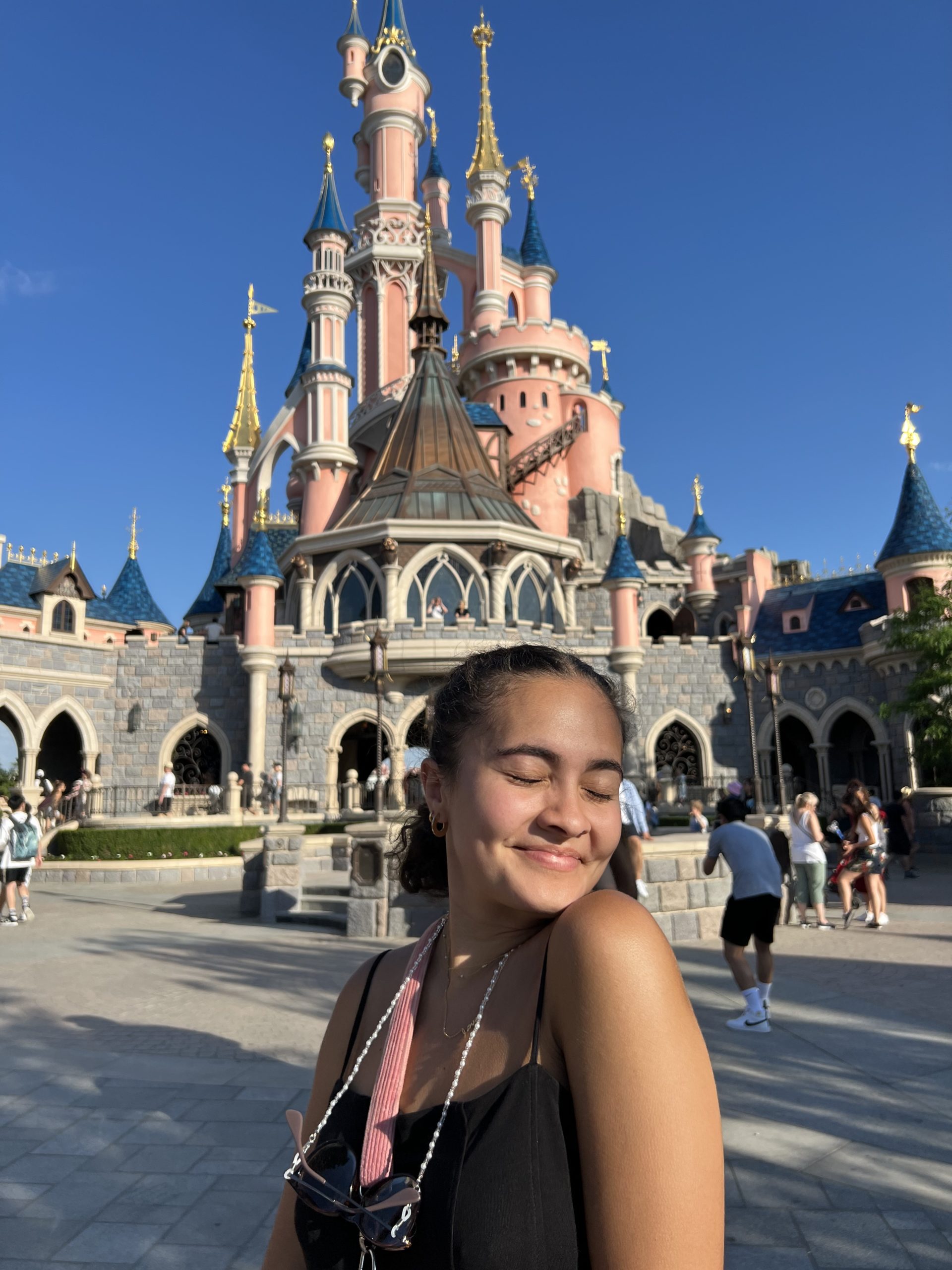 Girl in front of Disneyland Paris castle