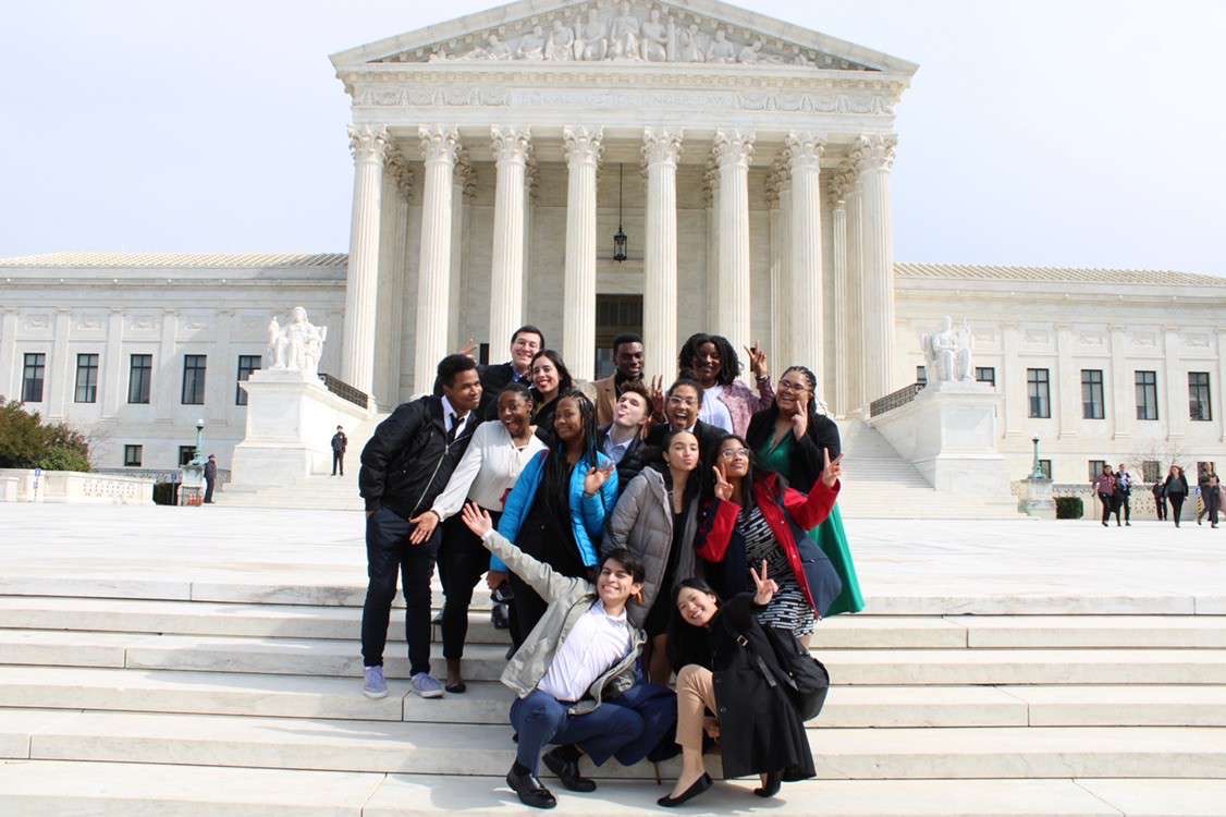 Group of students standing in front of the Supreme Court Building in Washington, DC.