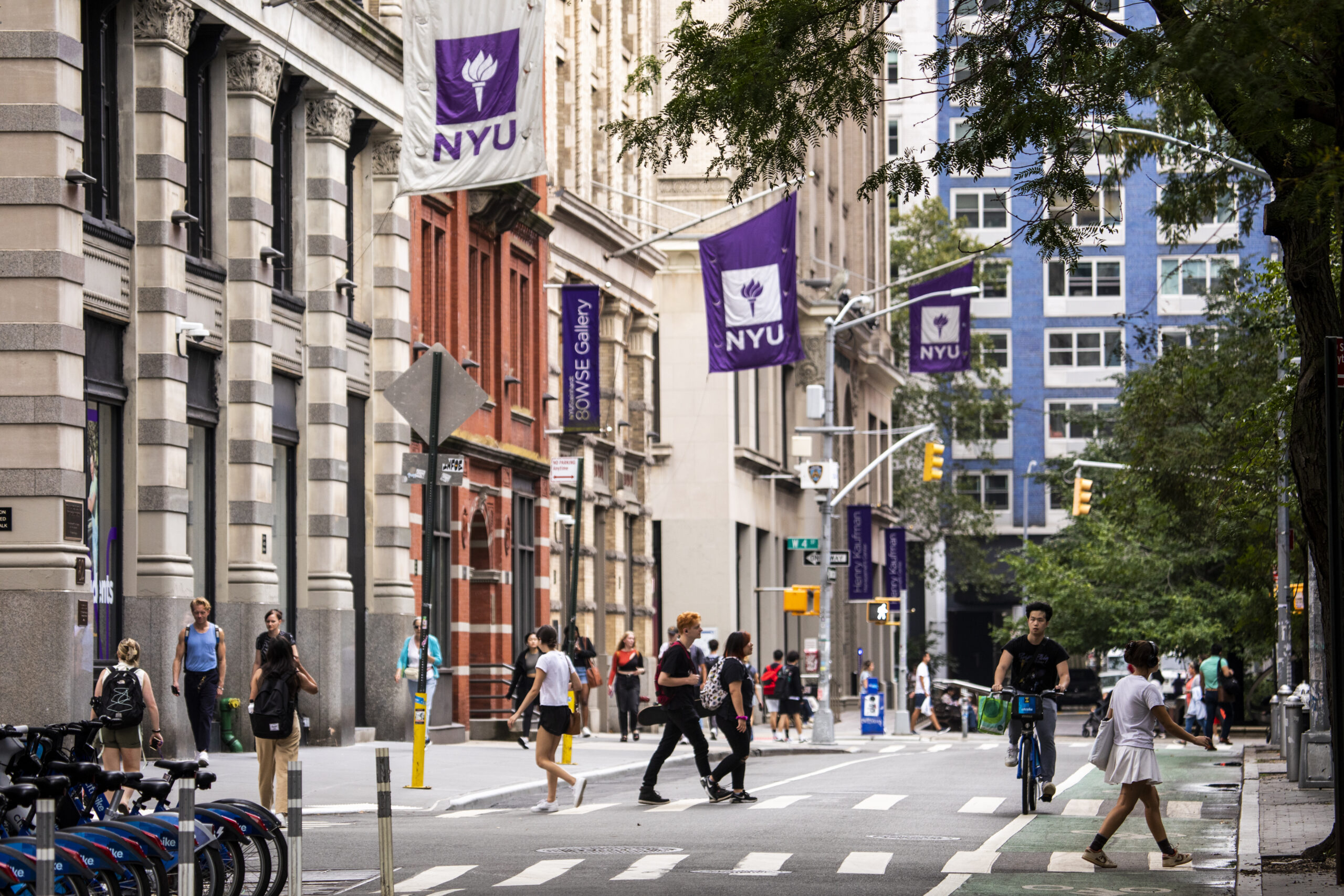 Students passing through the NYU campus in Greenwich Village.