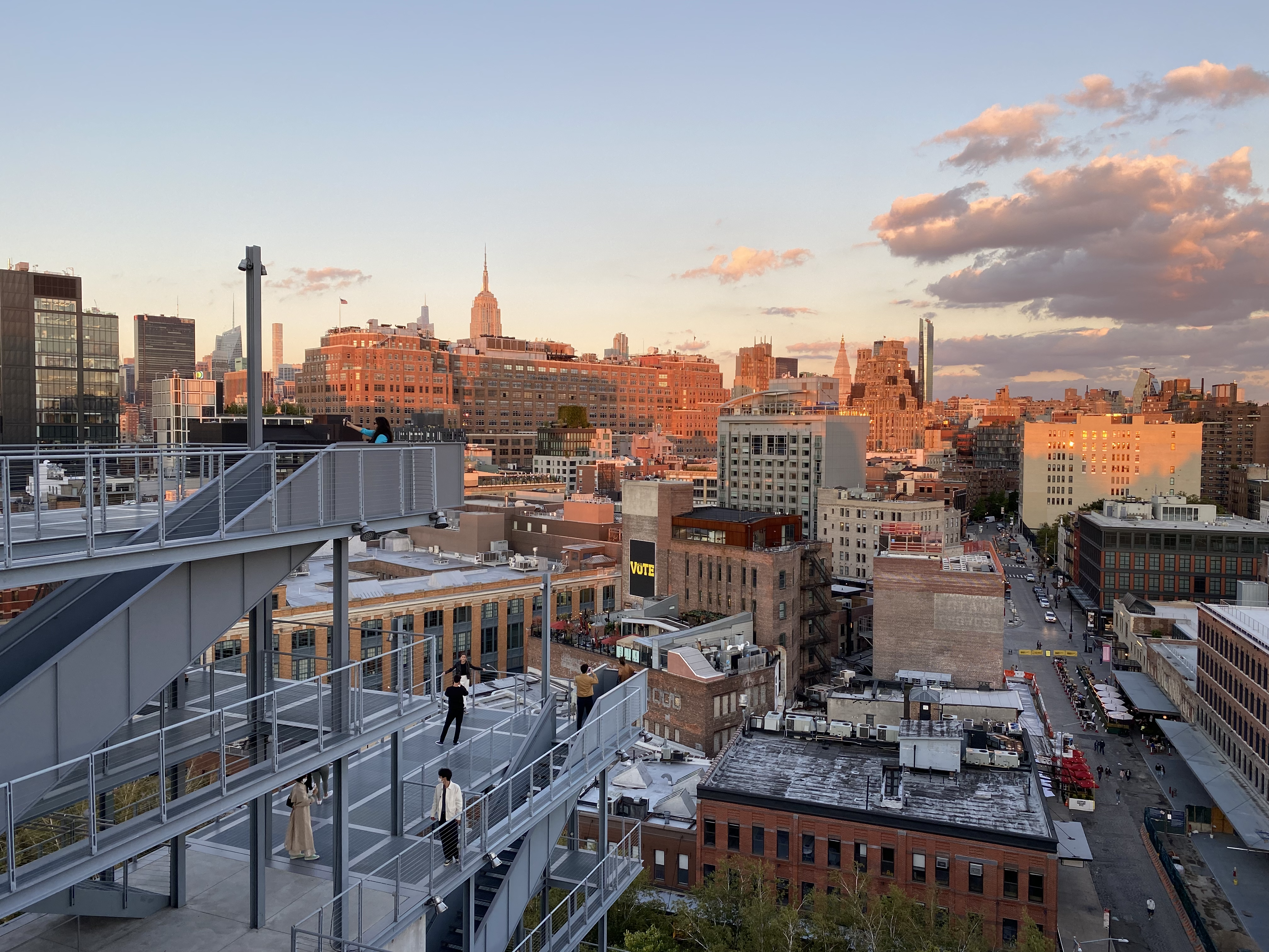 A view of the Manhattan skyline during dusk from one of the balconies of the Whitney Museum.