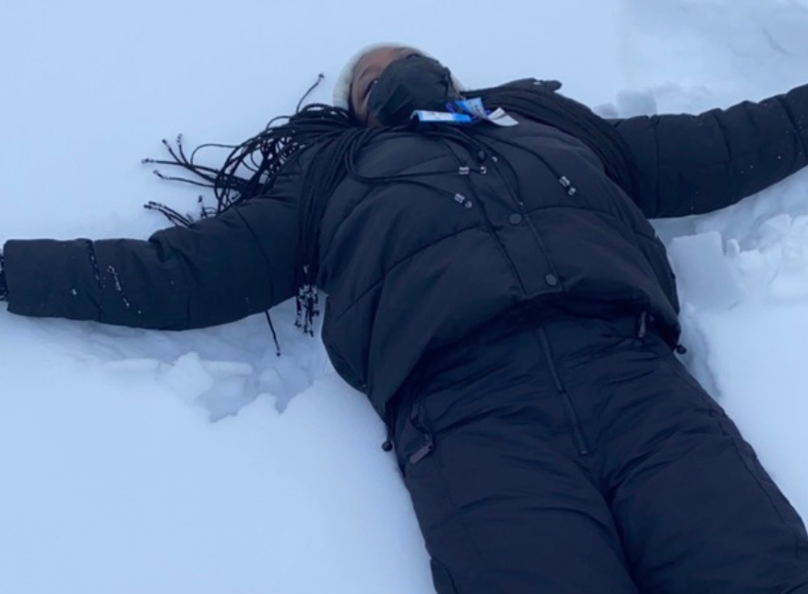 Kitan makes a snow angel