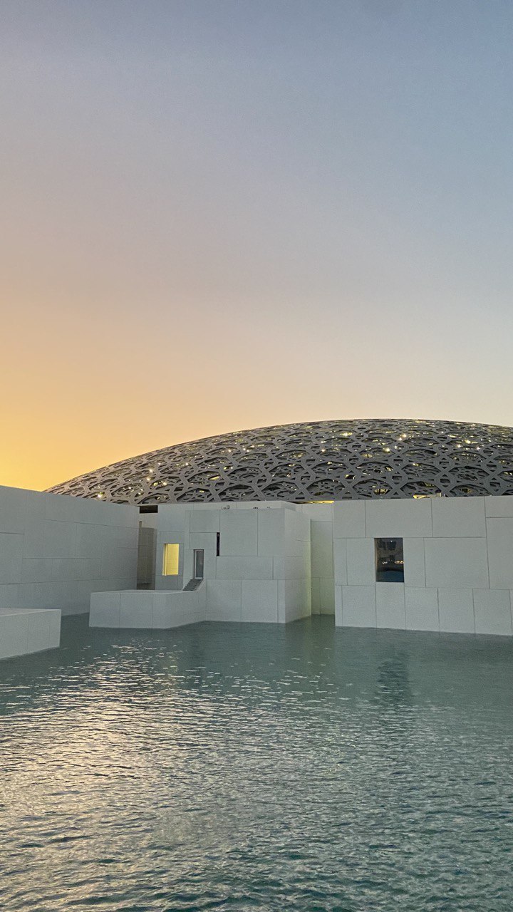 The Louvre Abu Dhabi at sunset