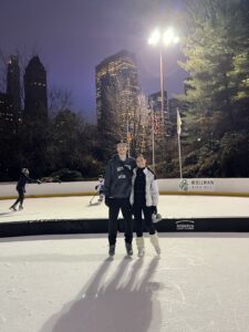 Two NYU students ice-skating in Central Park during NYU Flurry. 