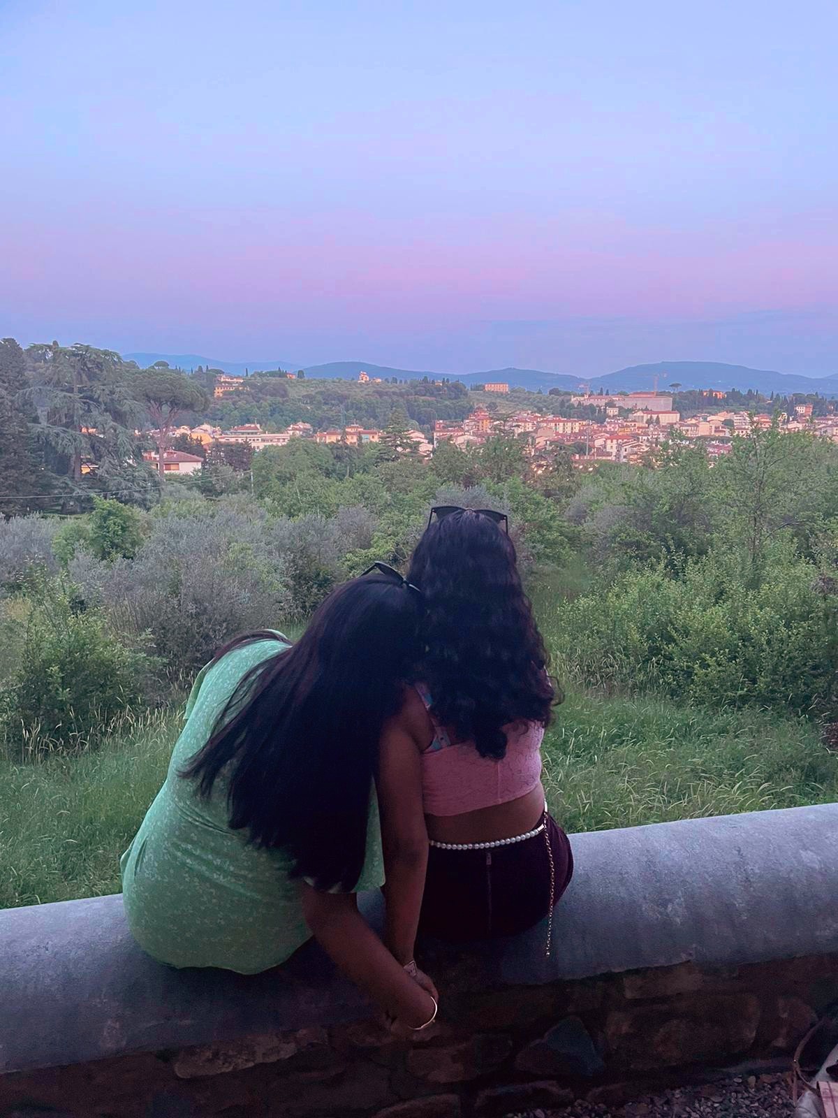 eshika and friend watching the sunset in florence