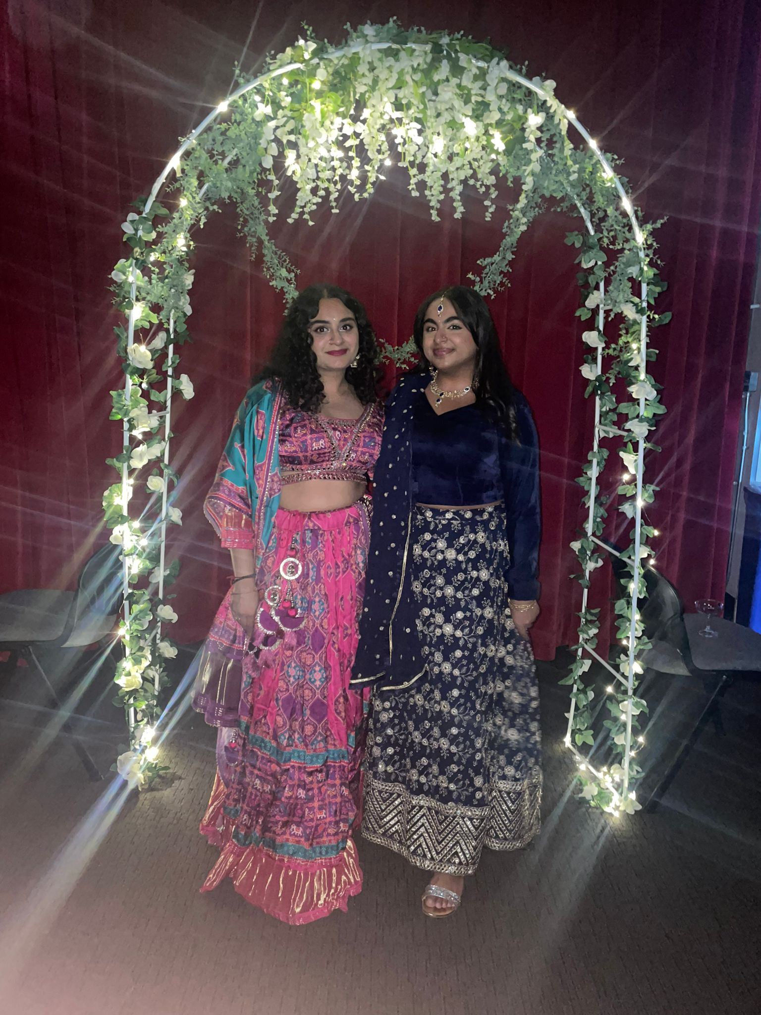 Eshika and friend in traditional indian wear at the sorority's charity gala event