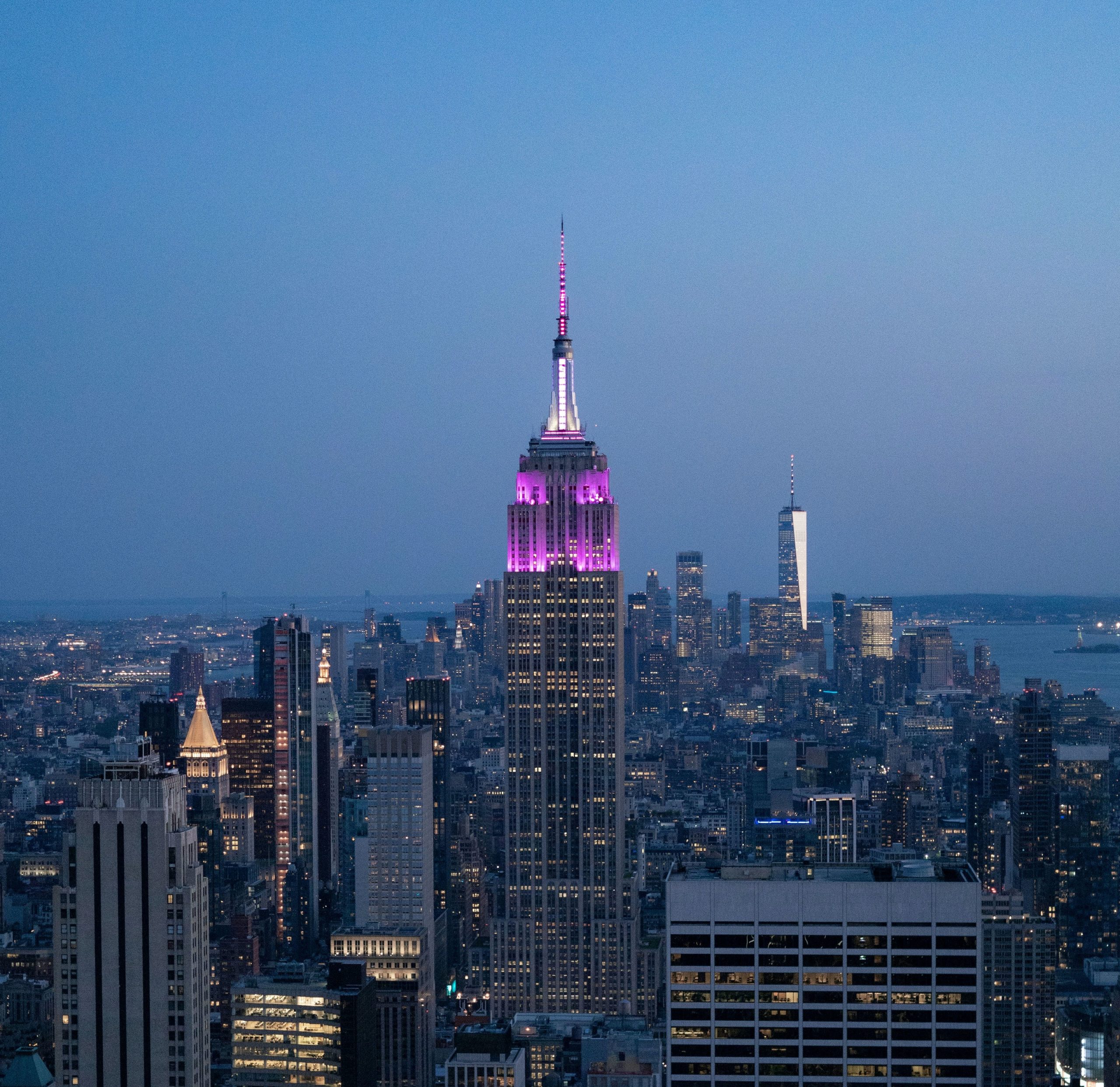 The Empire State Building lit up in purple for NYU graduates.