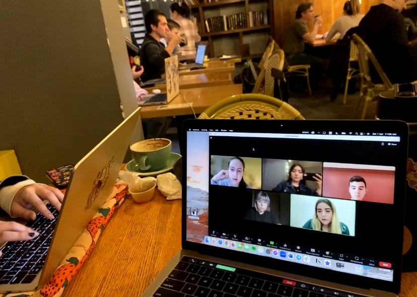 an image of a Zoom meeting taking place on a laptop