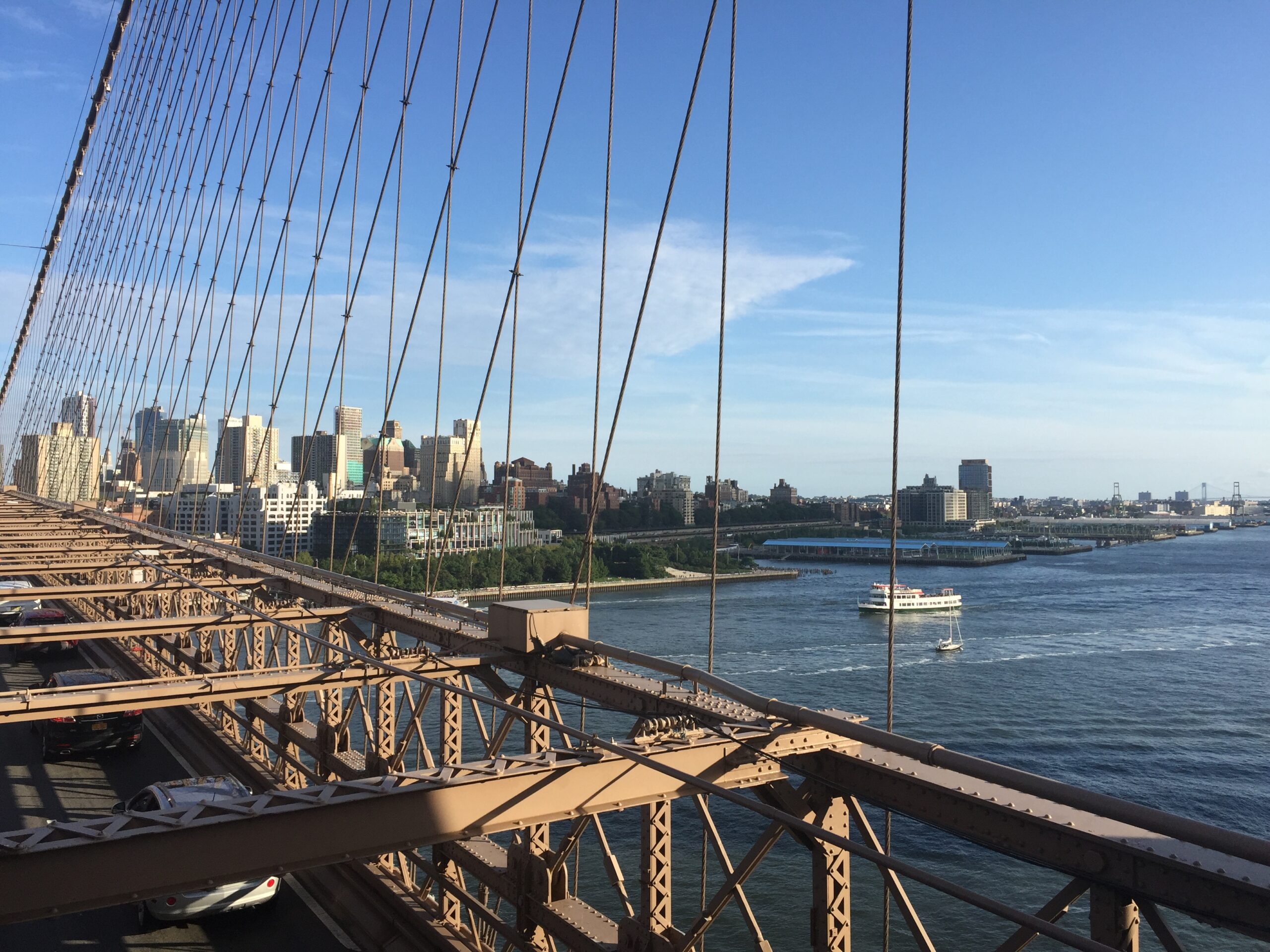 A pedestrian’s view of the East River from the Brooklyn Bridge.
