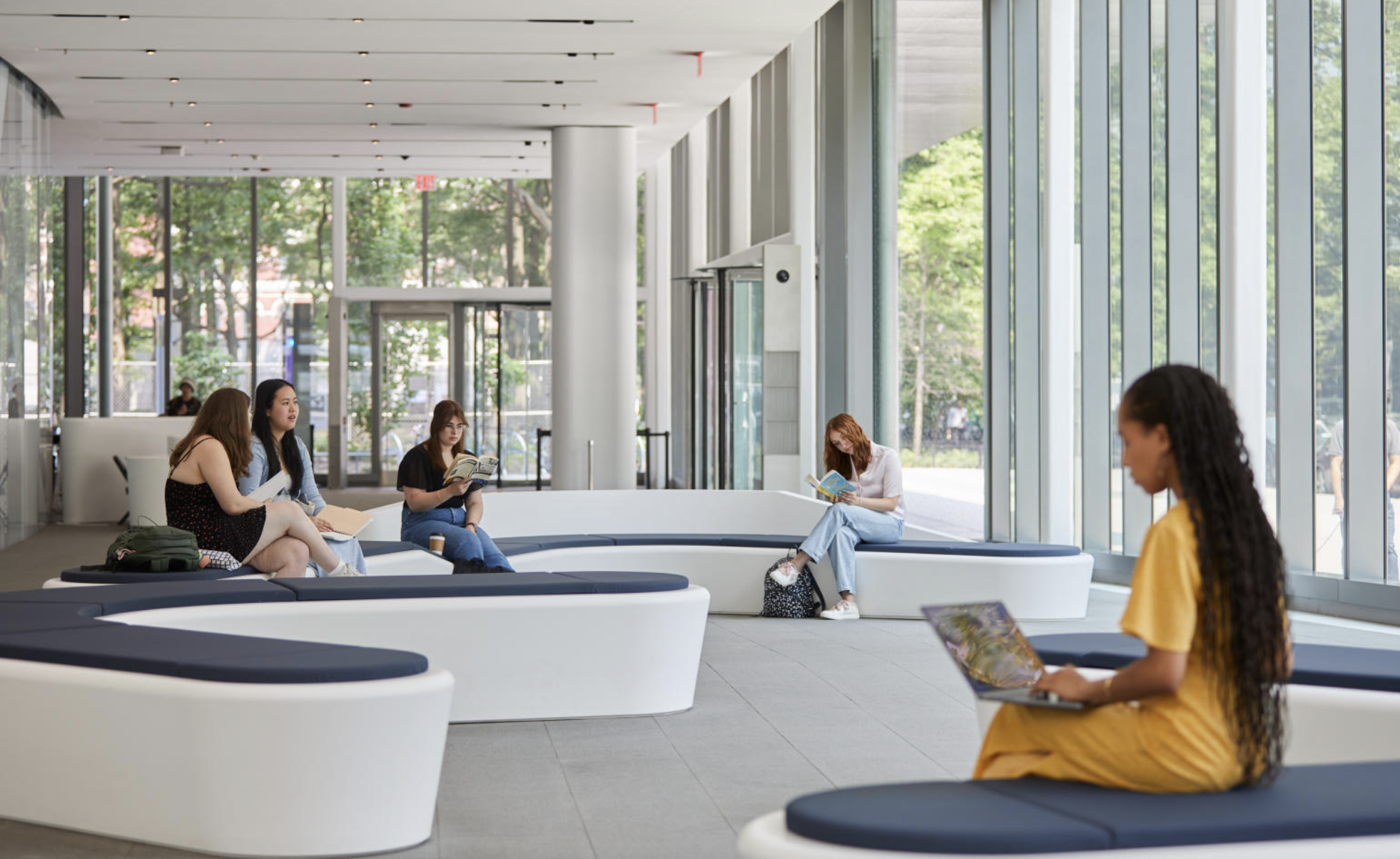 students sitting and studying in the lobby of the Paulson Center