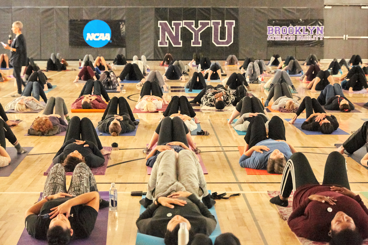 A group of students taking the free yoga class at NYU Tandon.