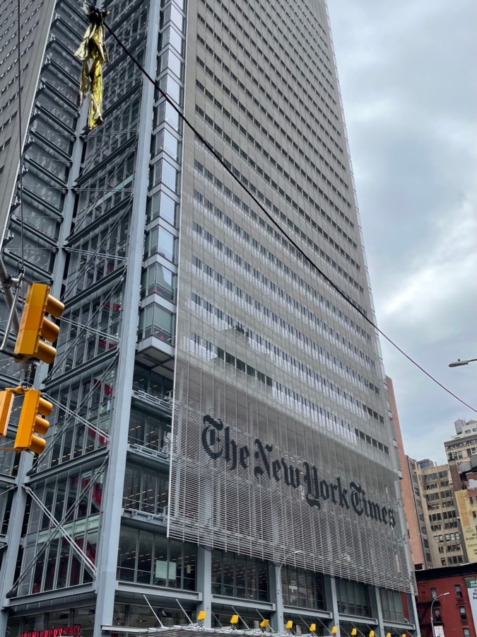 Daytime photo of the “New York Times” headquarters.