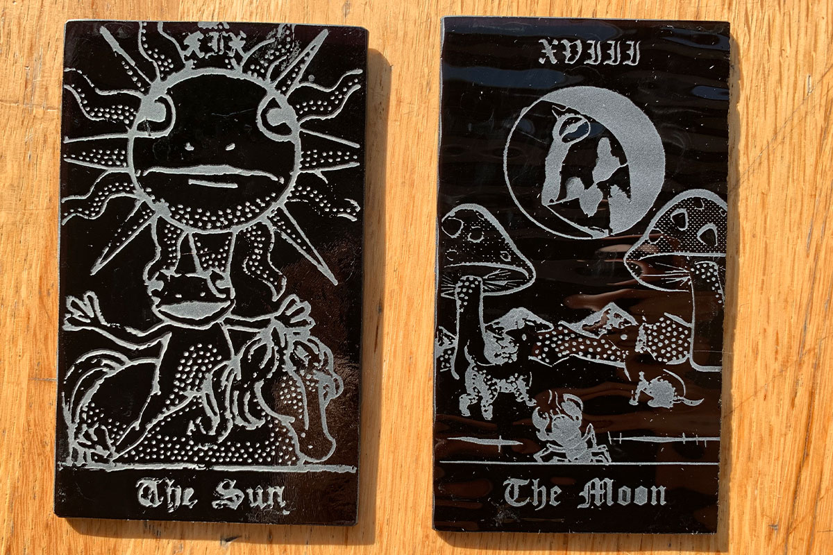 Sun and moon tarot card iterations featuring frogs and scorpions.