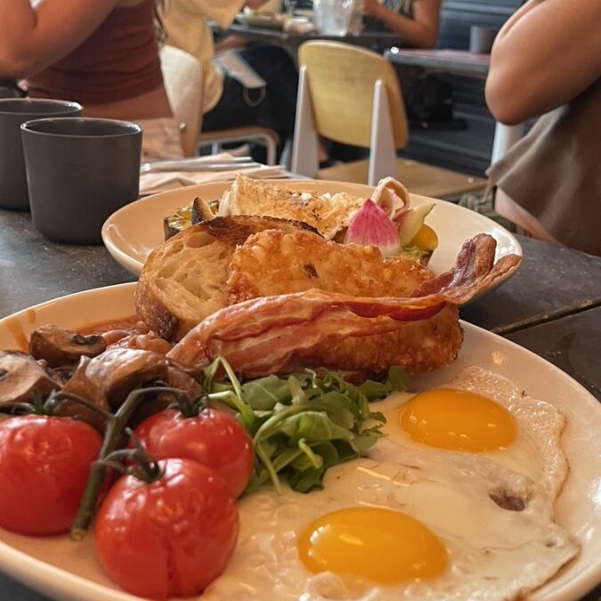 photo of a dinner plate with eggs and salad
